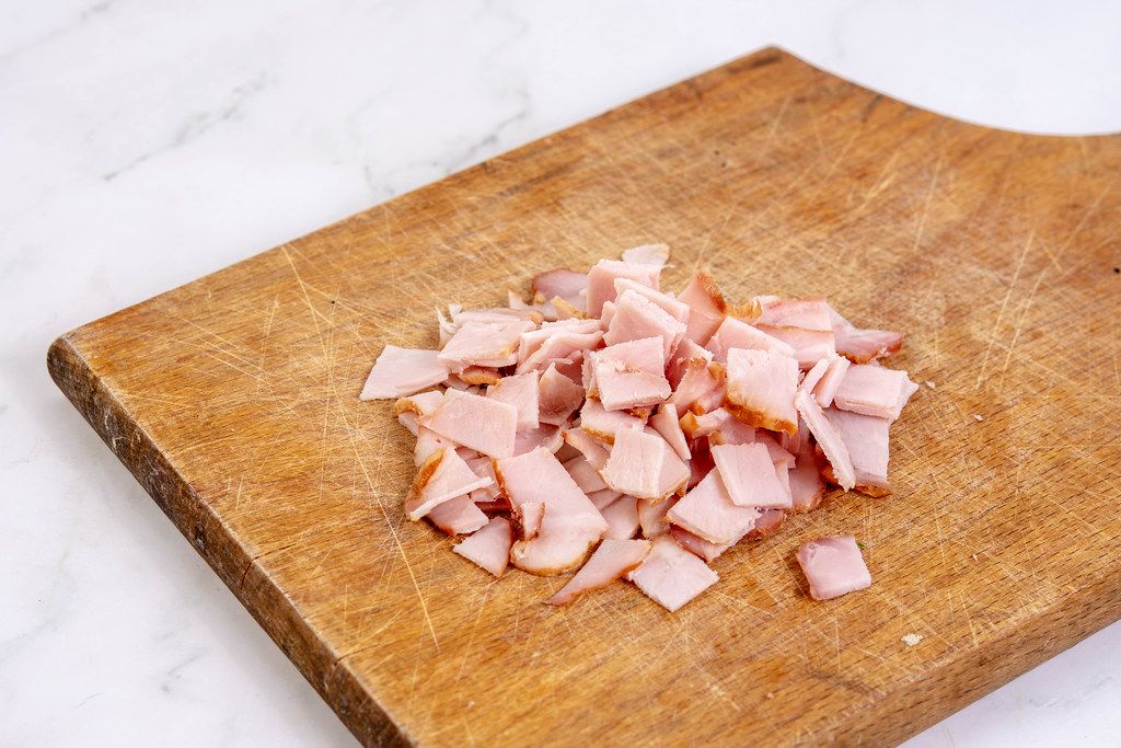 Sliced Ham on the wooden cutting board