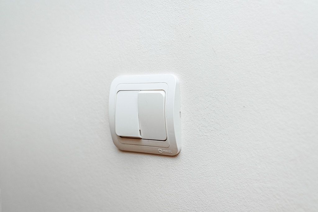 Switch On Whiter Wall. Background