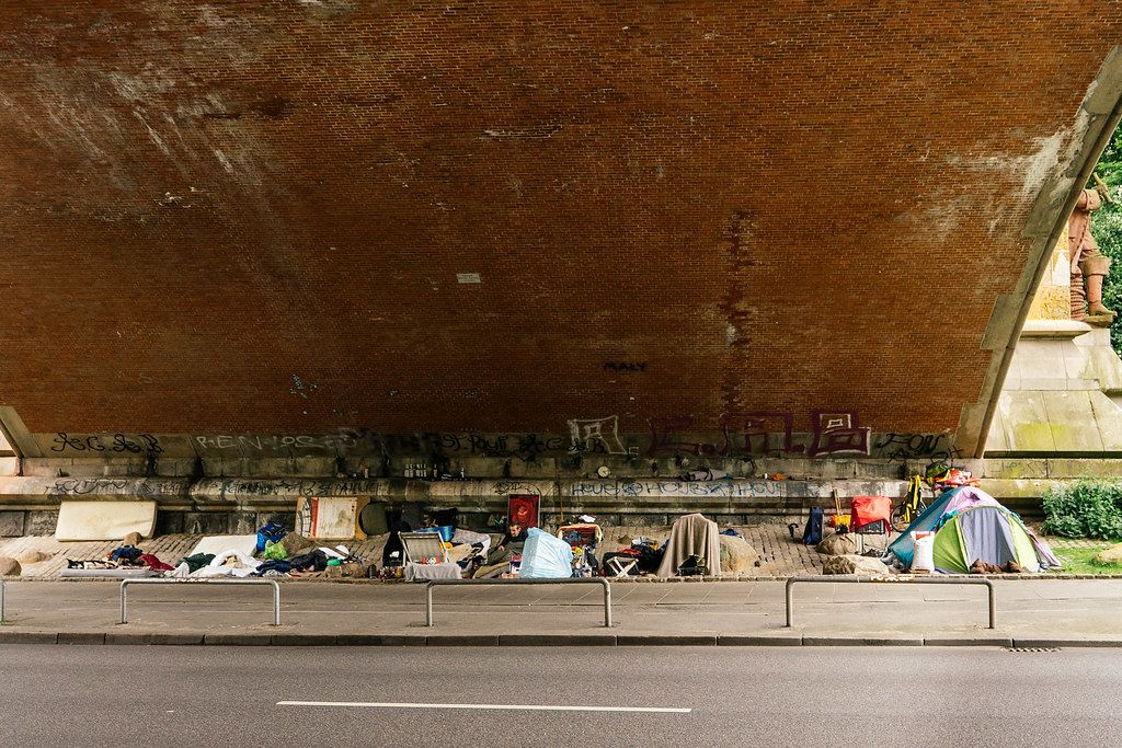 Tents, Chairs and other Materials of Homeless people under a Bridge