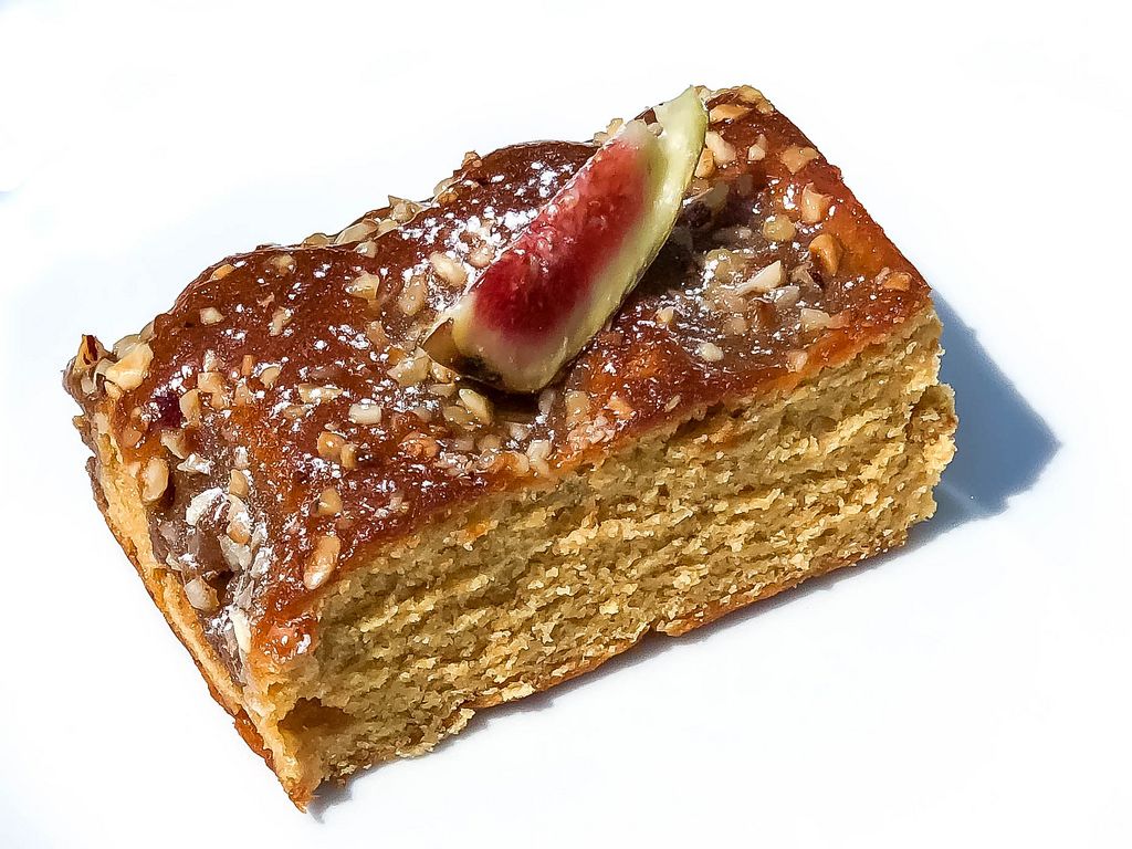 Toffee-hazelnut cake with piece of fig on top