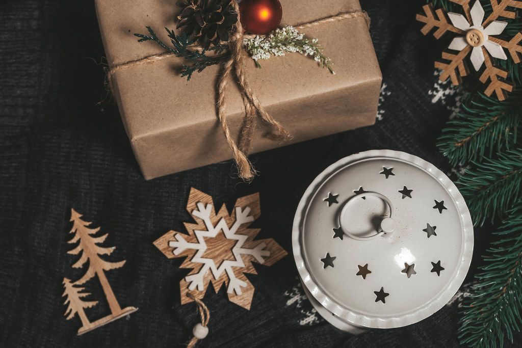 Top view gifts, lantern and Christmas decor on black background (Flip 2019)