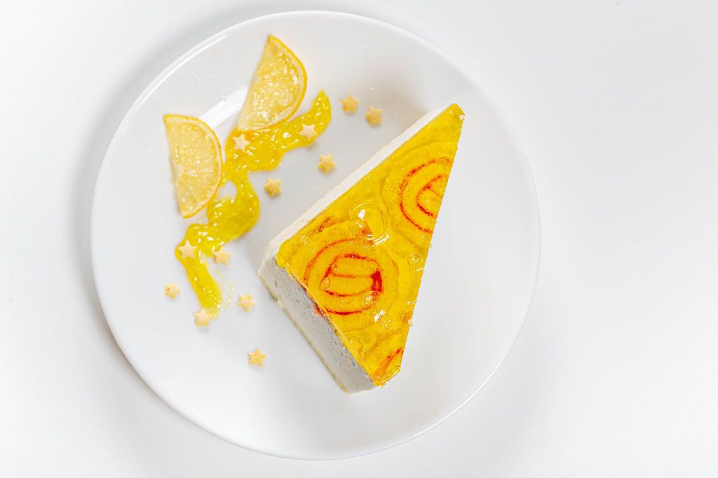 Top view lemon cake on a white plate