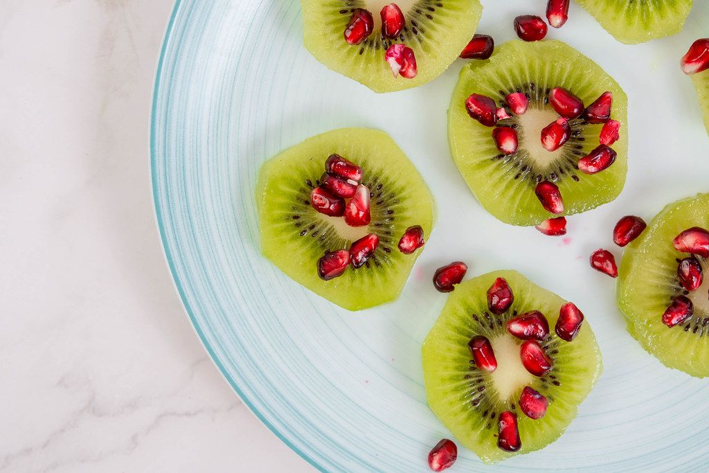 Top view of Sliced Kiwi with Pomegranate