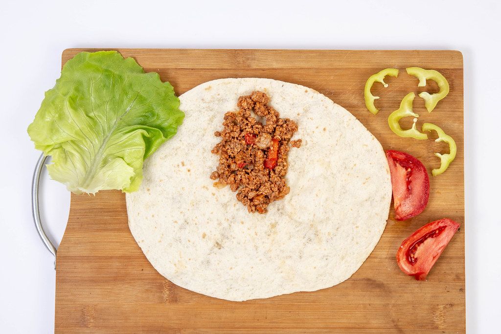 Top View Of Tortilla With Minced Meat Tomato Lettuce Flip 2019