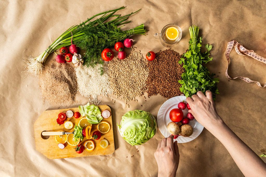 Top view to organic food background with cutting board and lemon slices (Flip 2019)