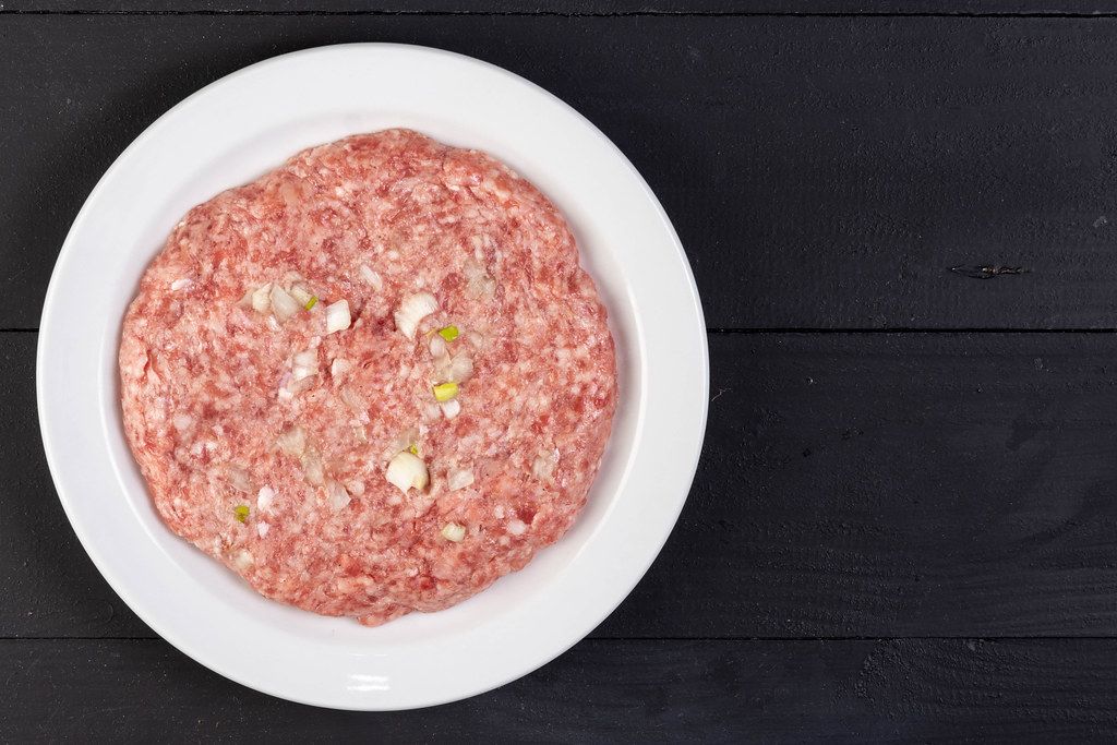 Traditional Serbian Pljeskavica with minced meat and onion (Flip 2019)