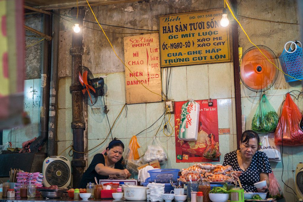 Vietnamese Food Vendor at Dong Xuan Market in Hanoi