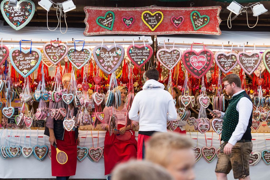 Visitors buying gingerbread hearts - Oktoberfest 2017