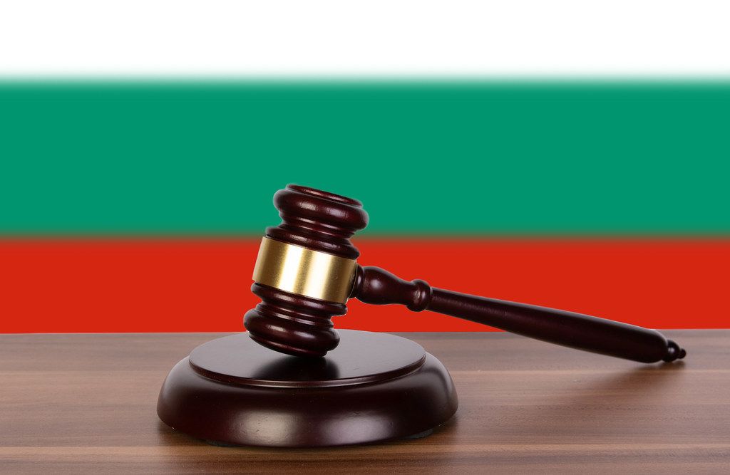 Wooden gavel and flag of Bulgaria