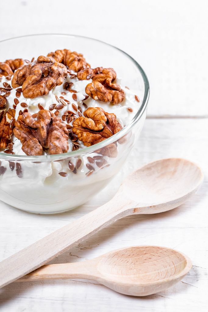 Yogurt-curd dessert with walnuts close-up (Flip 2019)