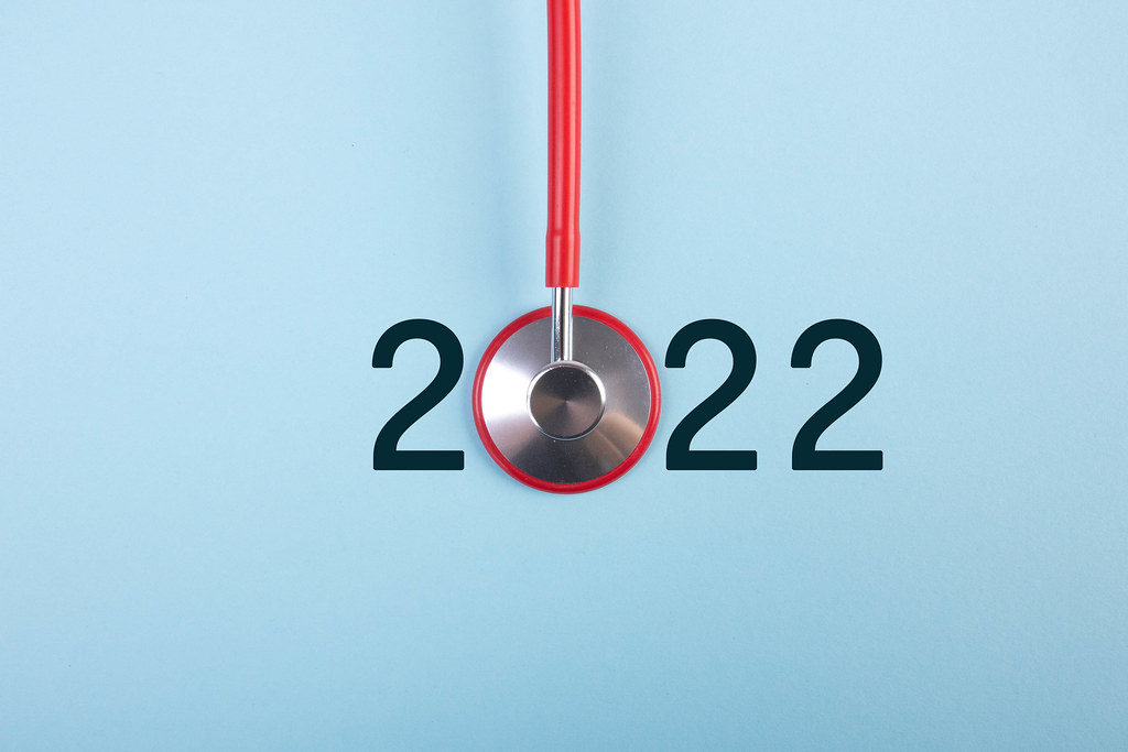 2022 text with red stethoscope on blue background