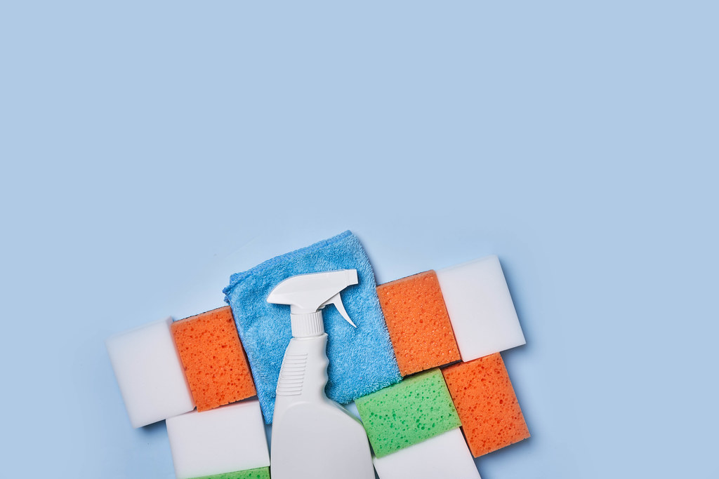 21. Sponges and cleanser on blue background.jpg