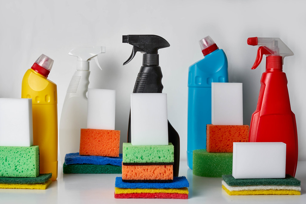3. Various cleaning supplies, bottles and sponges. Cleaning concept.jpg