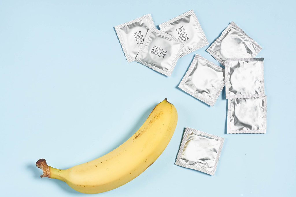 A banana and pile of condoms