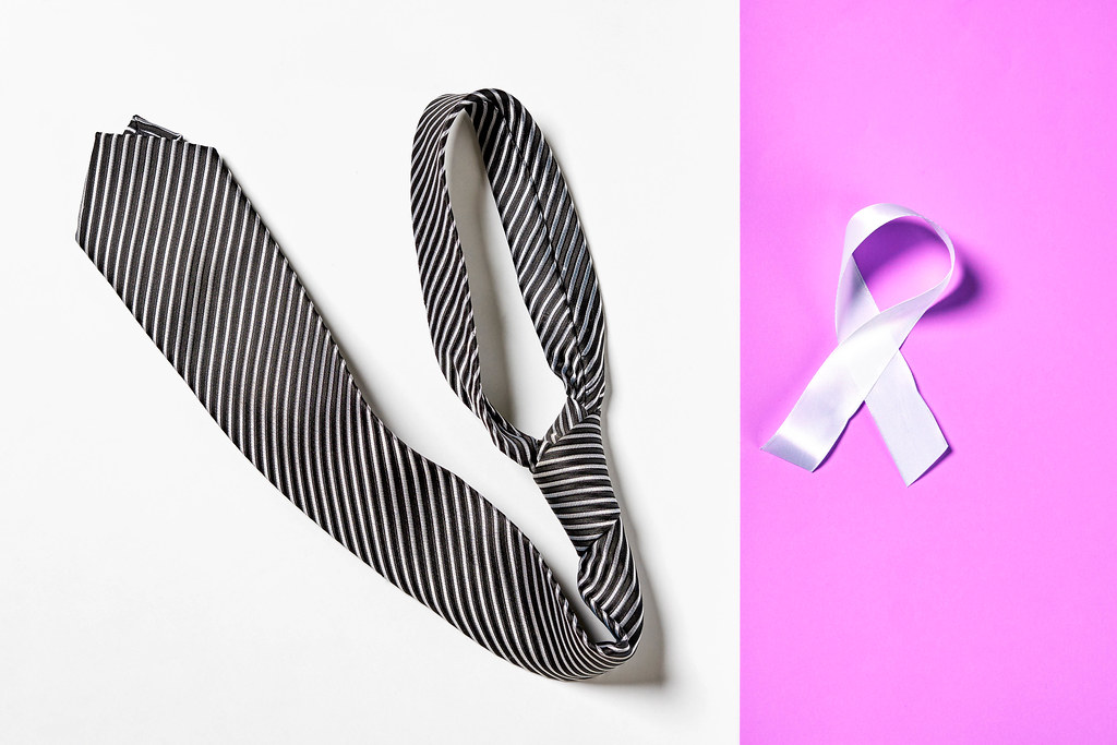 A men's tie and white ribbon - Prostate Cancer Awareness Month