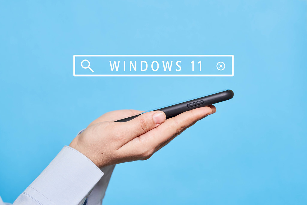 A person searching information about features of new Windows 11