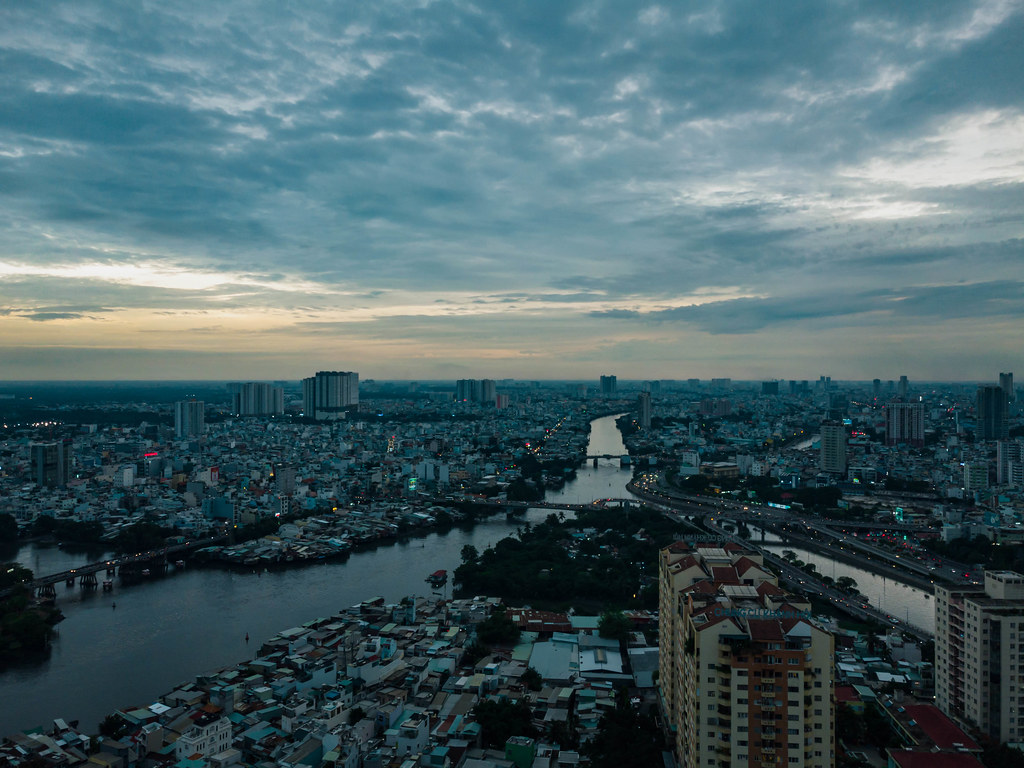 Aerial Sunset Drone Photo of Bridges over Saigon River connecting District 1, District 4 and District 8 in Ho Chi Minh City, Vietnam