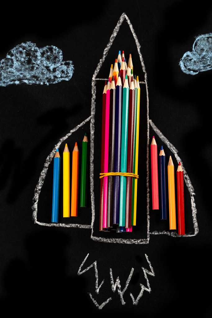 Airplane made from colored pencils, school concept