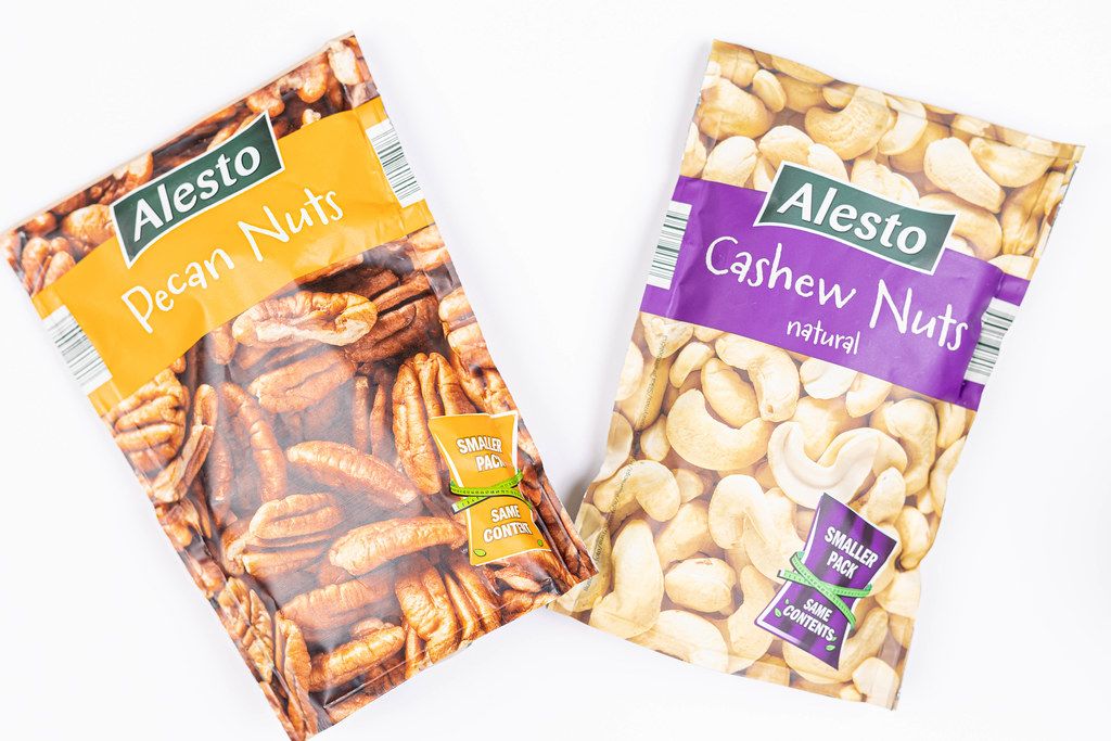 Alesto Peckan nuts and Cashew packages on the table