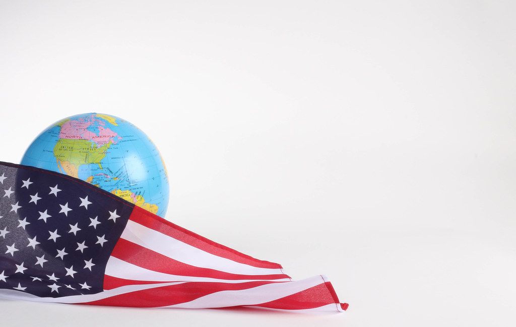 American flag with globe