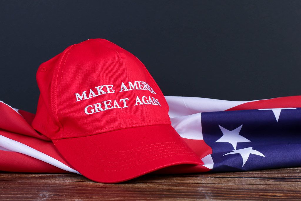 American flag with Make America Great Again hat