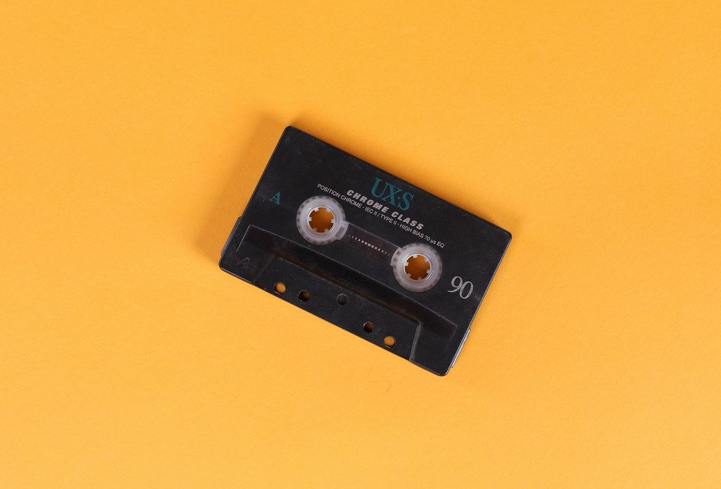Audio Cassette on orange background