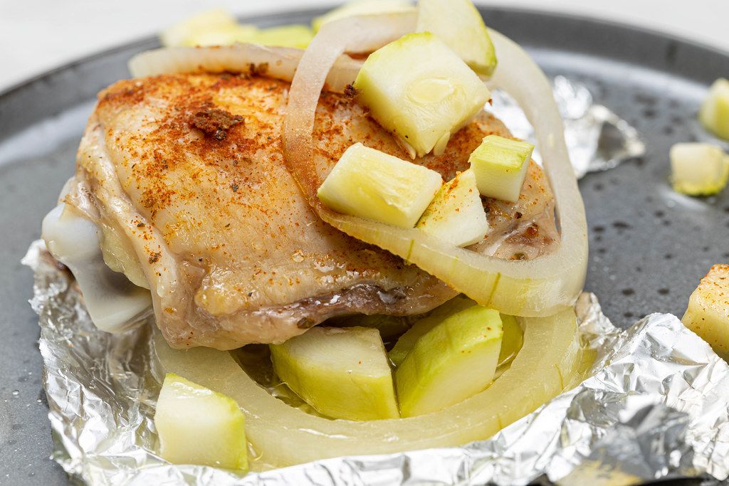 Baked Chicken Drumstick with foil and vegetables
