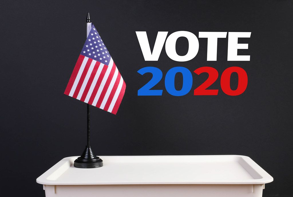 Ballot box with American flag and Vote 2020 text