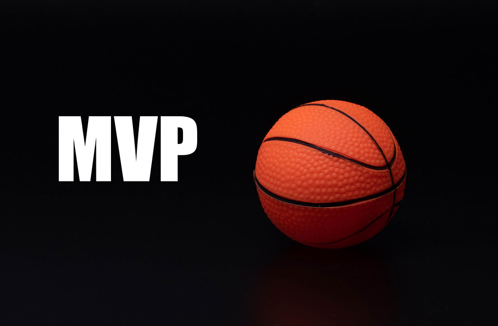 Basketball ball with MVP text on black background