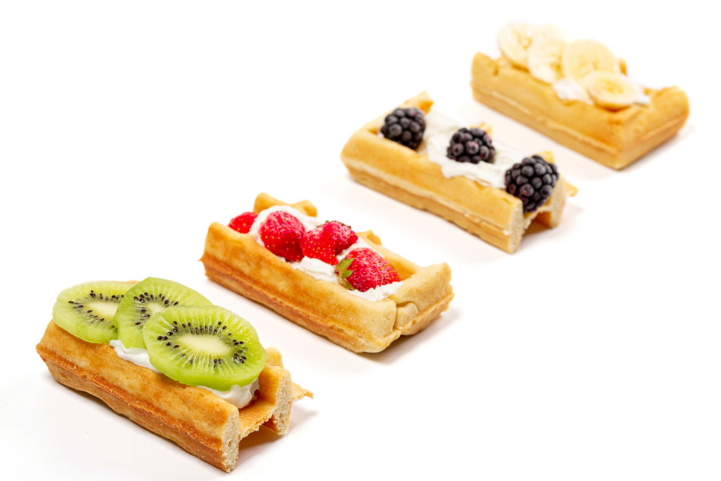 Belgian waffles with whipped cream and fruit
