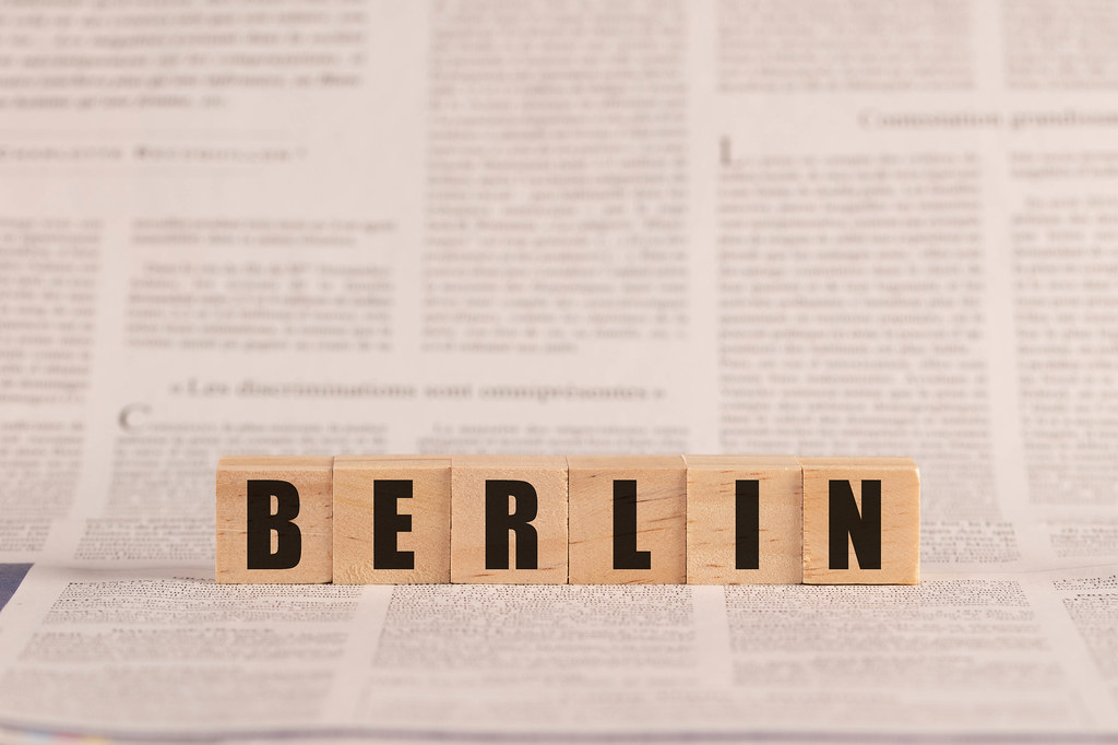 Berlin written with cubes on a newspaper