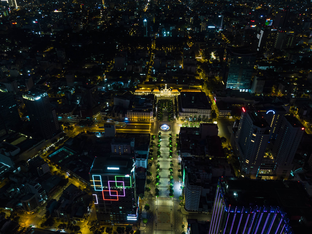 Bird View Drone Photo of the Lotus Flower Water Fountain in front of the Ho Chi Minh Statue and the People's Committee Building on Nguyen Hue Walking Street in Saigon, Vietnam