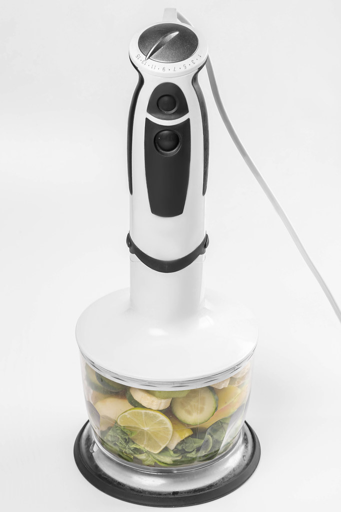 Blender with ingredients for smoothies, healthy food concept