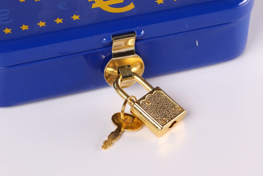 Blue metal cash box with golden locker