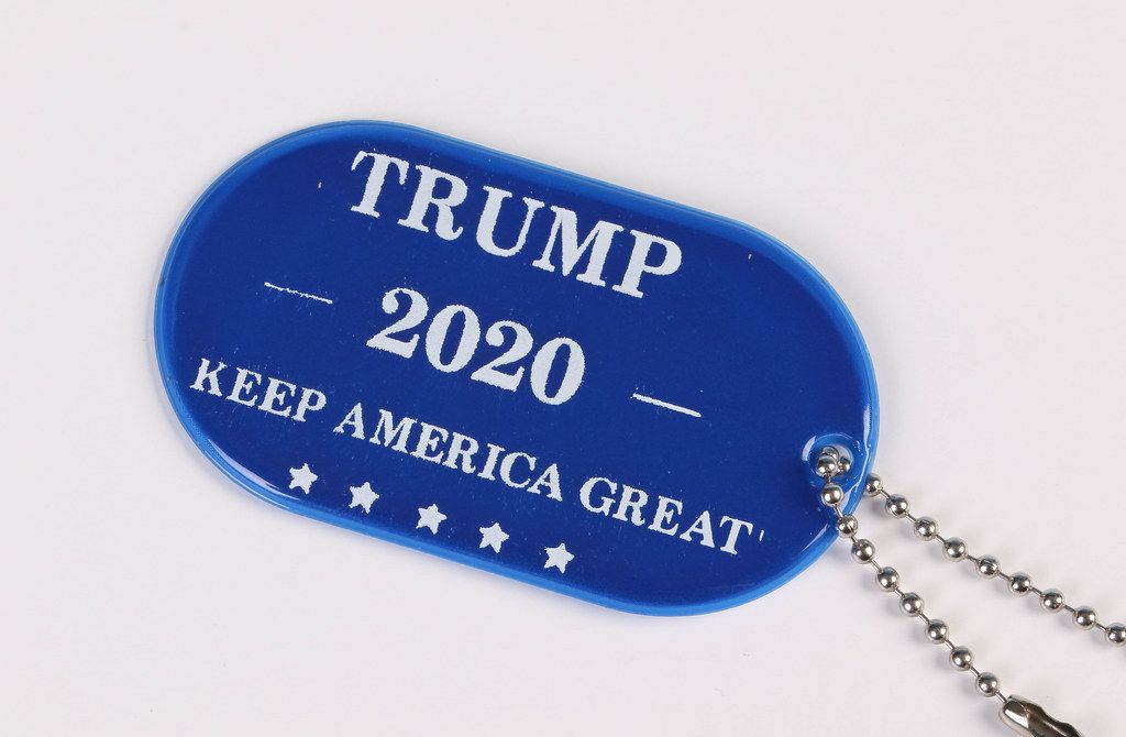 Blue military tag with Trump 2020 text on white background