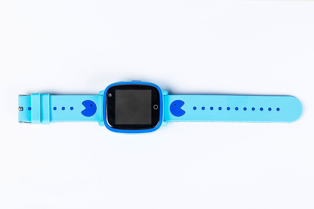 Blue smart watch on white background, top view