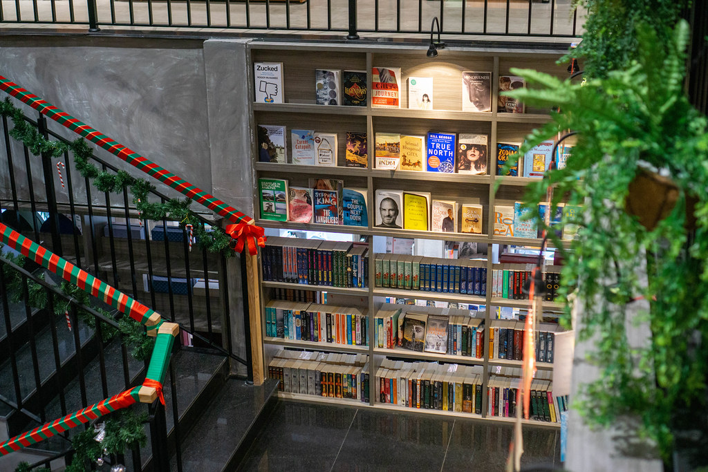 Book Display with different Softcover Books for Sale in a Staircase inside a Bookstore