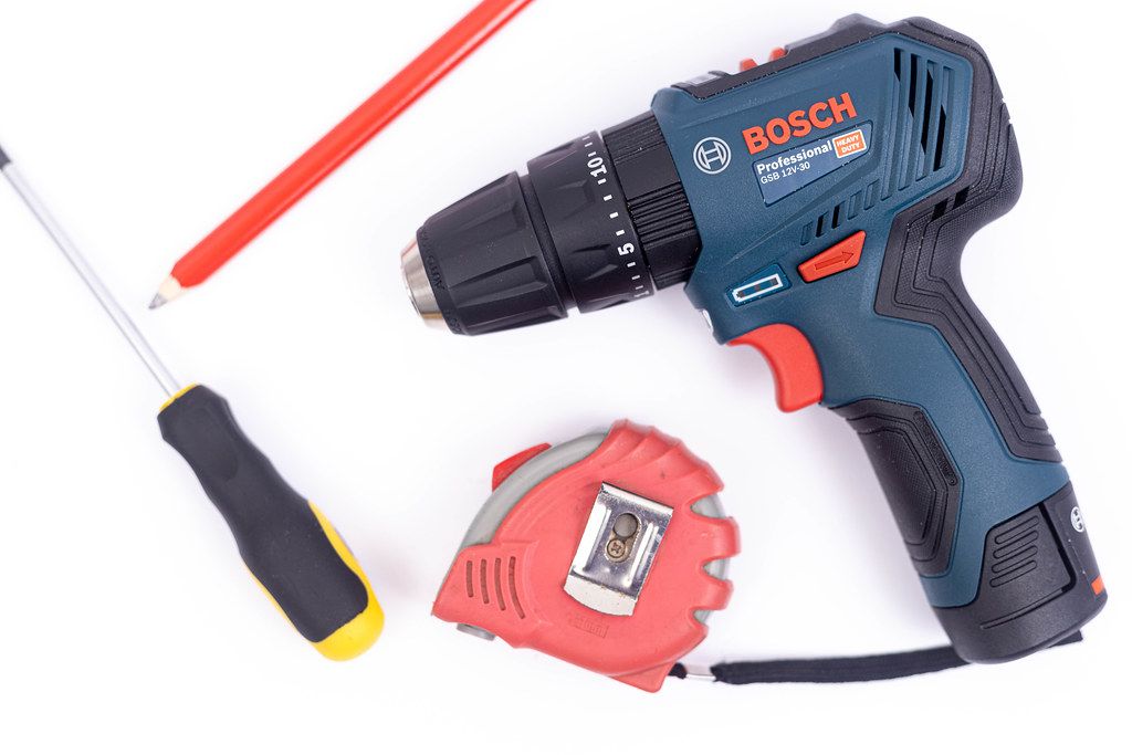 Bosch battery drill with Measuring Tape and Screwdrivers