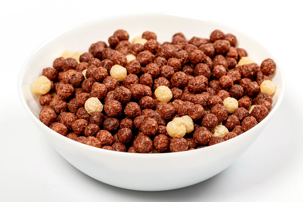 Bowl of chocolate and milk corn balls for breakfast