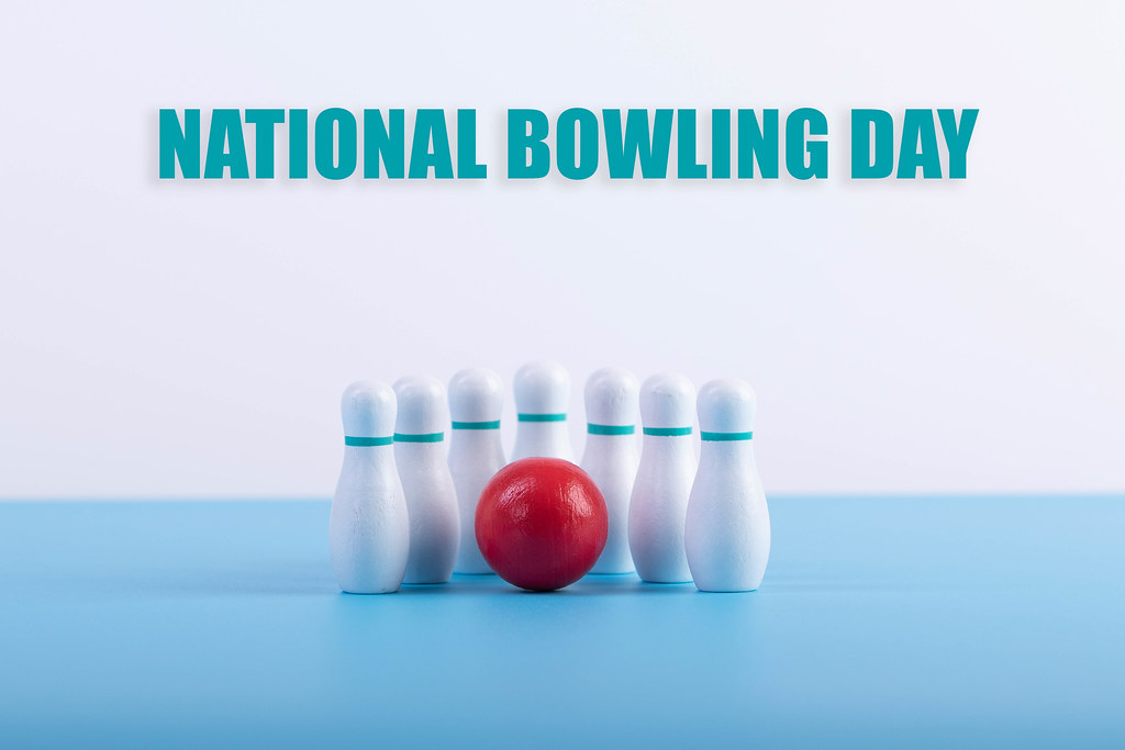 Bowling pins and ball with National Bowling Day text
