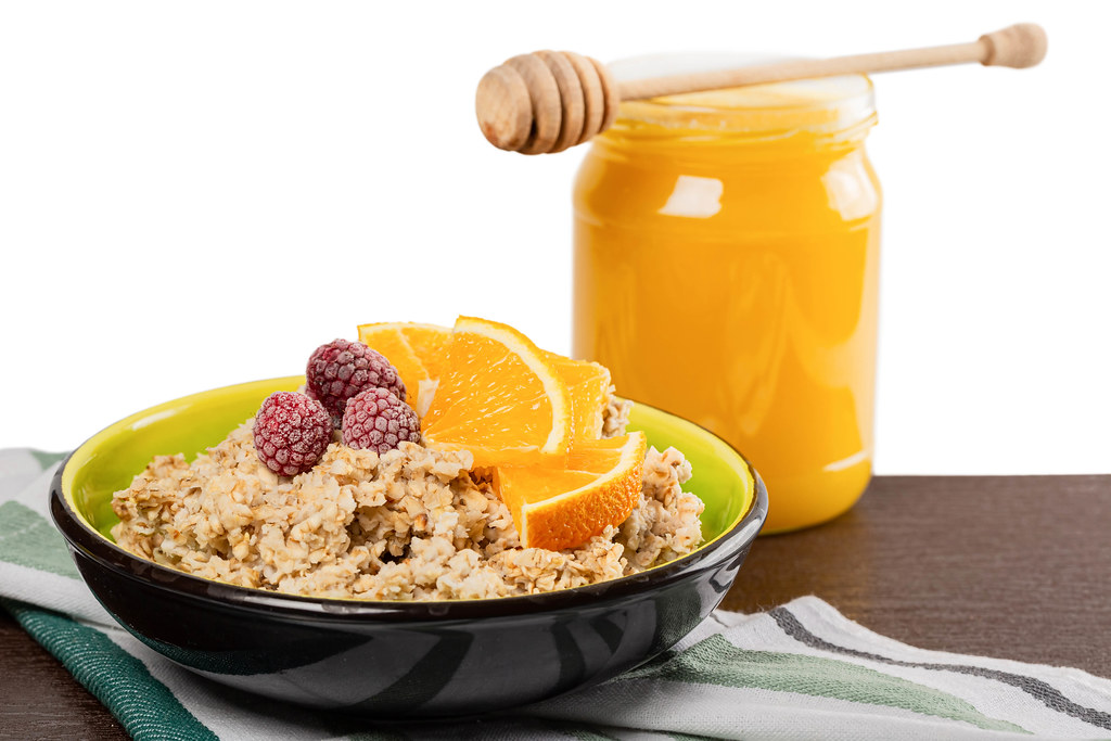 Breakfast oatmeal with fruit and honey