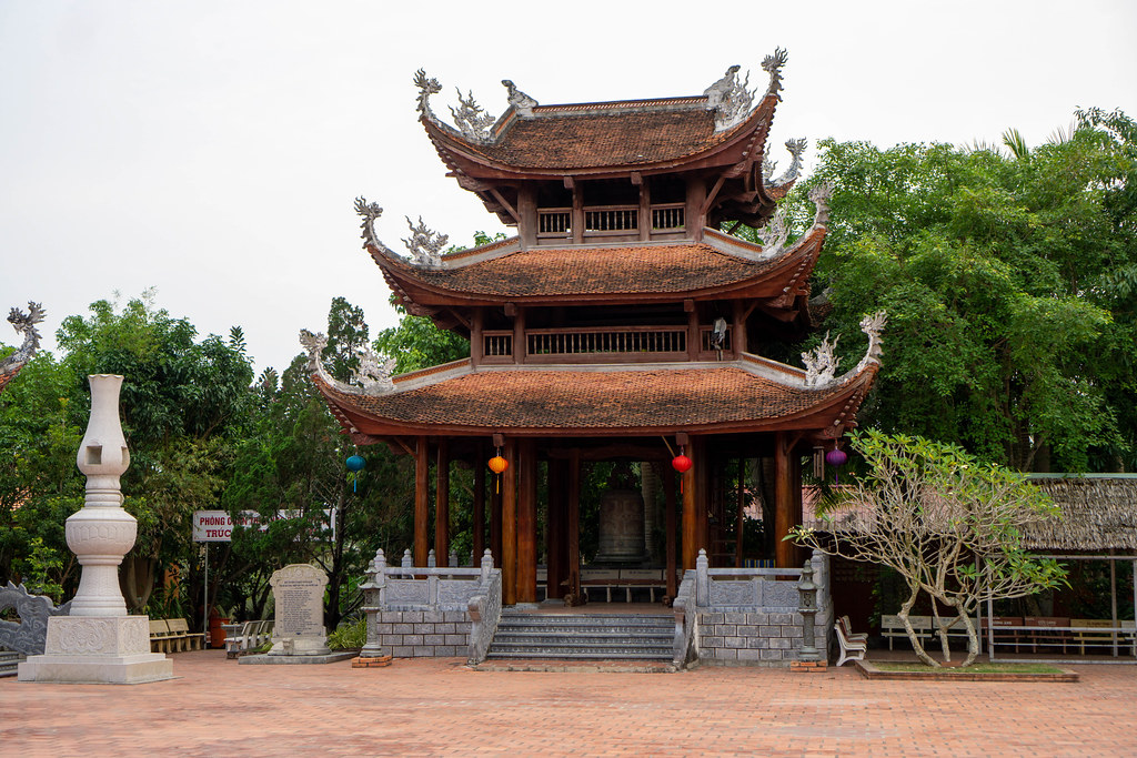 Buddhist Building with Large Bell and Lanterns at Truc Lam Phuong Nam Zen Monastery in Can Tho, Vietnam