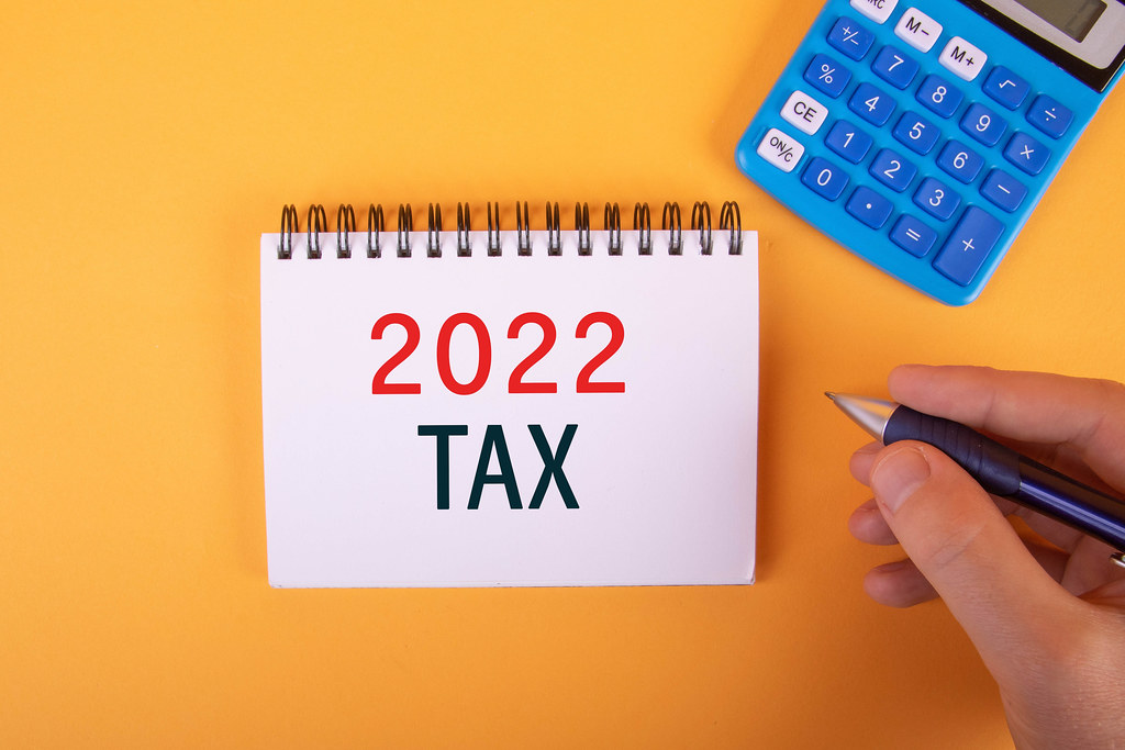 Calculator and notebook with 2022 Tax text