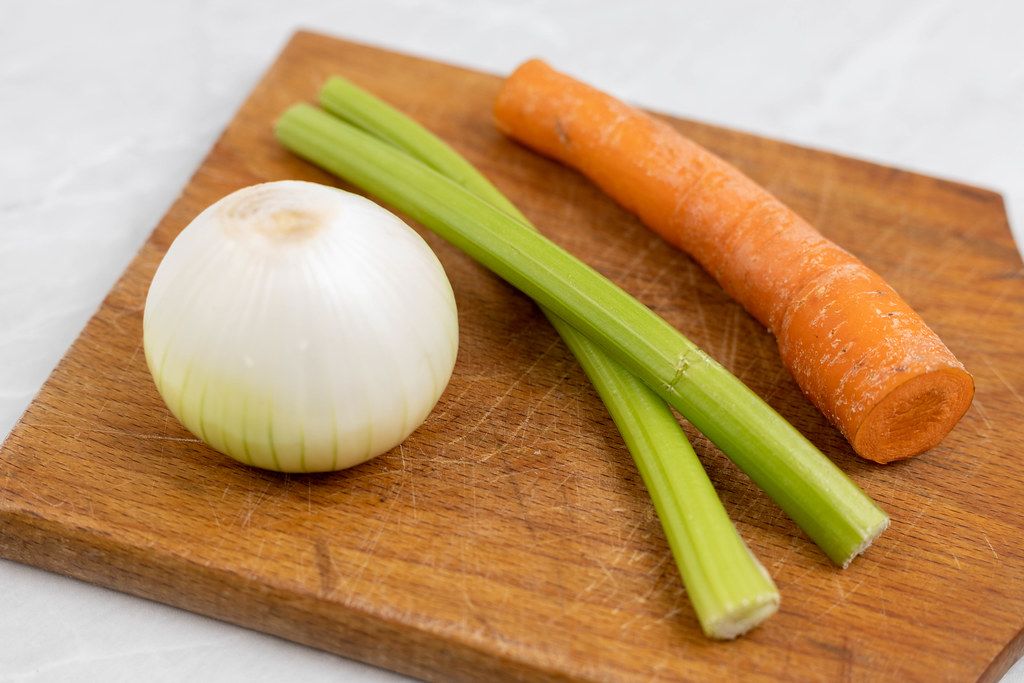 Carrot Celery and Onion on the wooden board