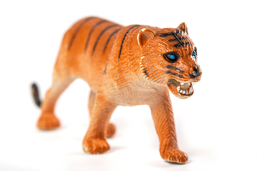 Children's toy tiger with open mouth