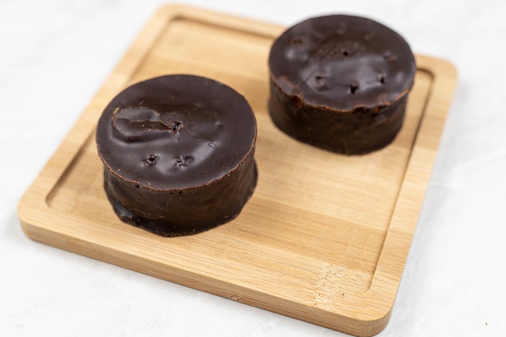 Chocolate Muffins on the square wooden board