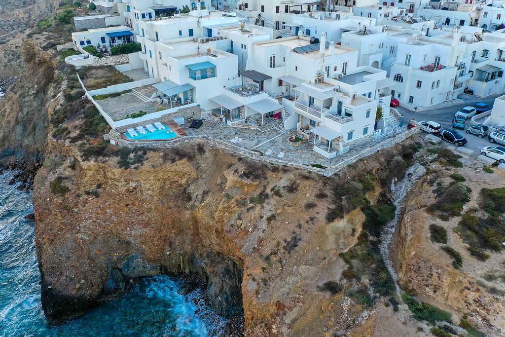Chora, Naxos, view of the cliffs and the typical buildings. Stunning location of Iliada Suites complex
