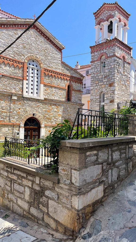Church of Agios Georgios of Kyratso with stone walls and bell tower on Skopelos, Greece