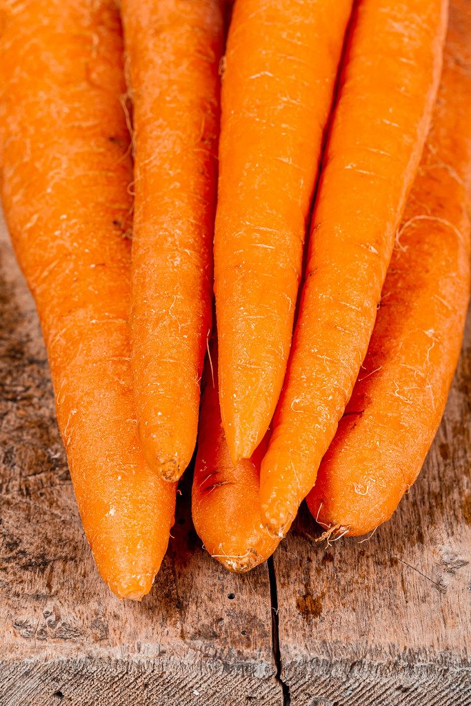 Close-up, carrots on an old wooden background