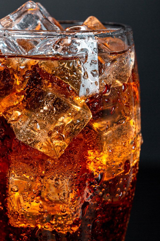 Close-up, glass of coca cola with ice